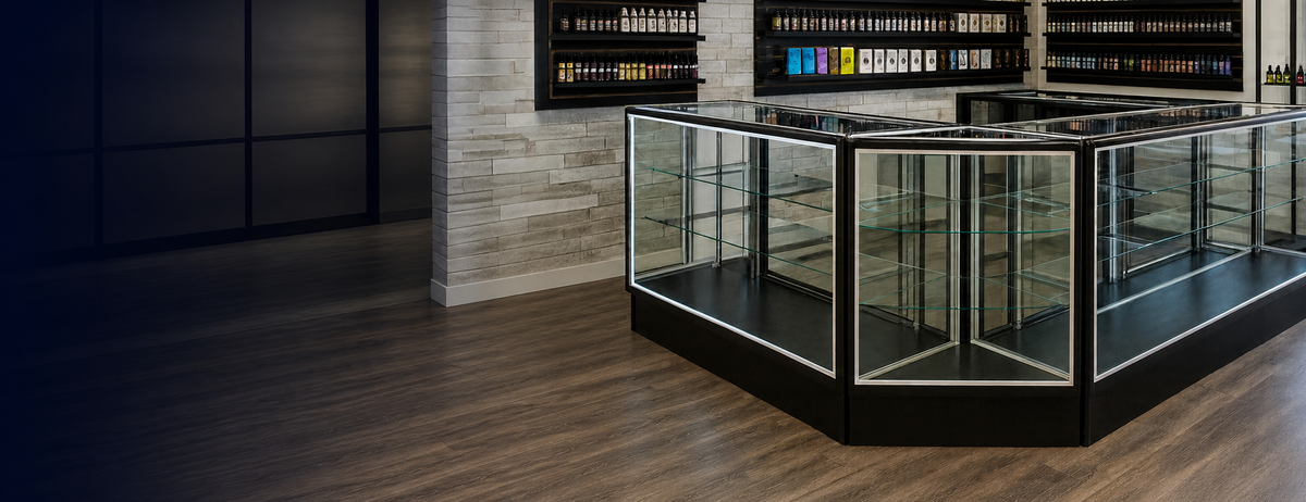 Glass retail display cases in a modern showroom
