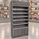 rustic-gray cigarette dispenser wallcase with locking storage doors in a muted smoke shop