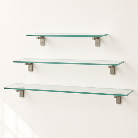 Clear tempered glass shelves in multiple sizes mounted on metal brackets