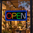 Neon Open Sign displayed in a storefront window