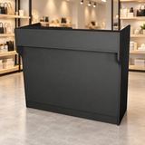 Retail Ledgetop Counter – Black, 4 ft, front view in a retail store