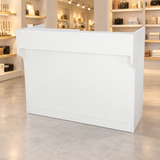 Retail Ledgetop Counter – White, 4 ft, front view in a retail store