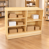 Maple 48" Retail Wrap Counter back view with plain inventory boxes in a retail store
