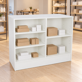 White 48" Retail Wrap Counter back view with plain inventory boxes in a retail store